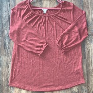 never worn before, thin but not see through, rusty maroon, dress shirt